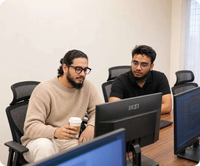 ZenhCare teammates collaborating at a desk